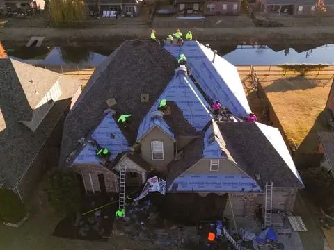 Crew on a multi-plane roof
