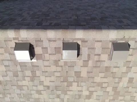 Architectural shingles and ridge vents