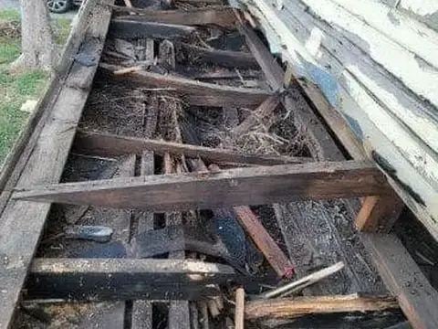 Rotted roof decking removed during a repair