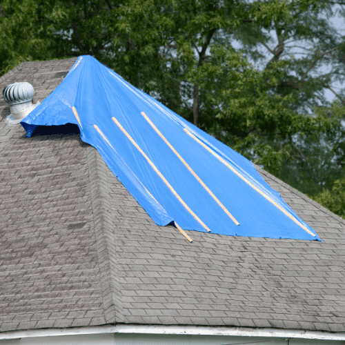 Temporary roof tarping service for emergency roof repairs
